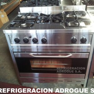 cocina Corbelli. 5 hornallas. mide 90 x 60. puerta de vidrio.